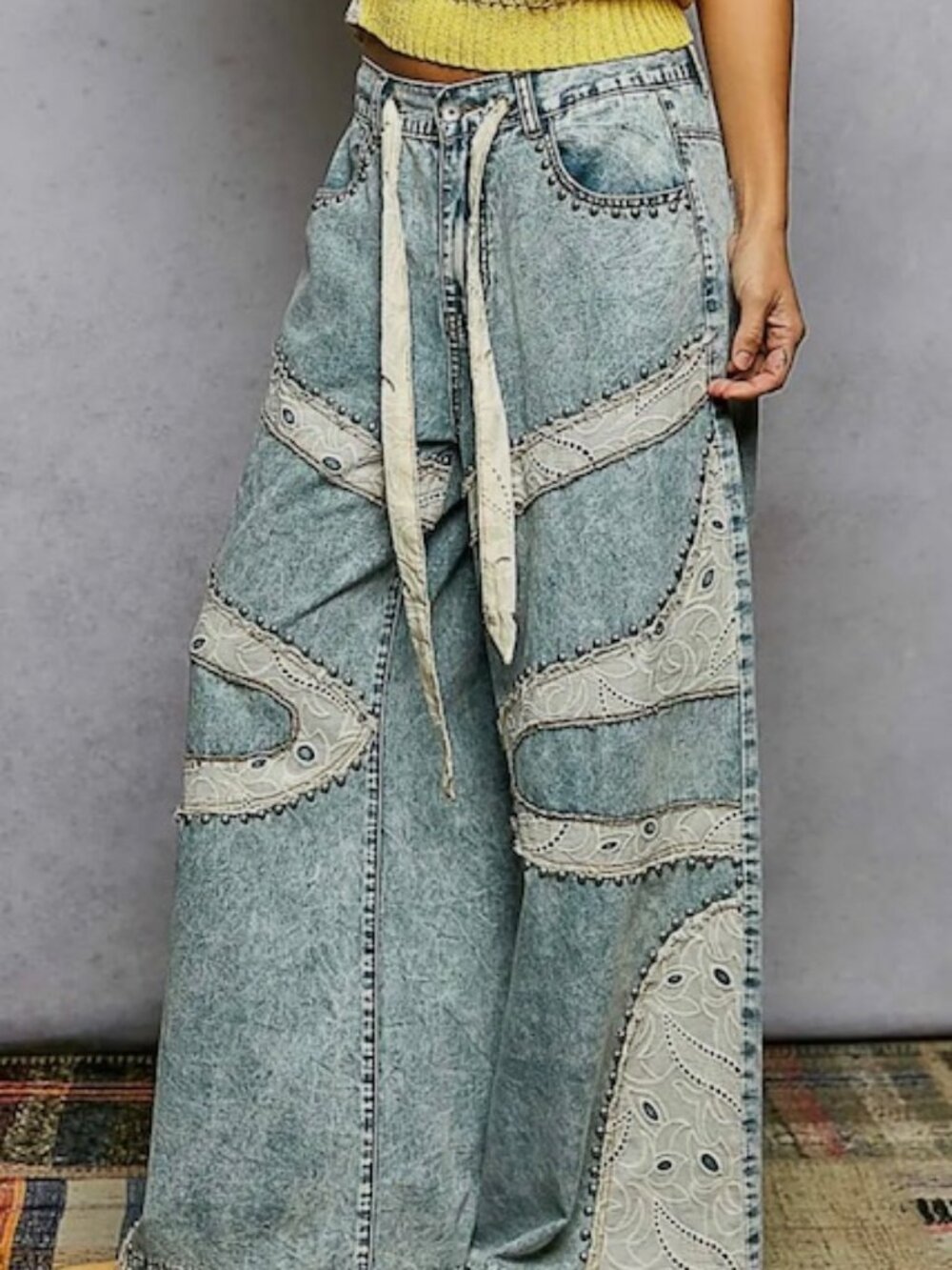 Lace patchwork detail denim jeans